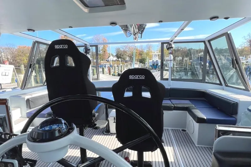 Slide: The Image of Interior of 2007 Morrelli & Melvin Shooting Star boat with Sparco seats and steering wheel. - 32