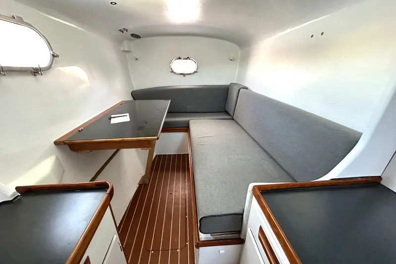 Slide: The Image of Interior of 2007 Morrelli & Melvin Shooting Star yacht with sleek seating and wooden accents. - 36