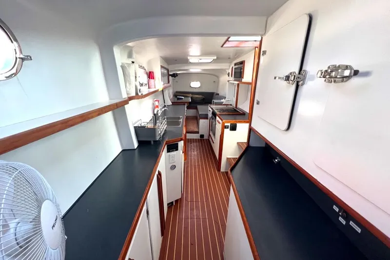 Slide: The Image of Interior of 2007 Morrelli & Melvin Shooting Star yacht, featuring sleek kitchen design. - 39