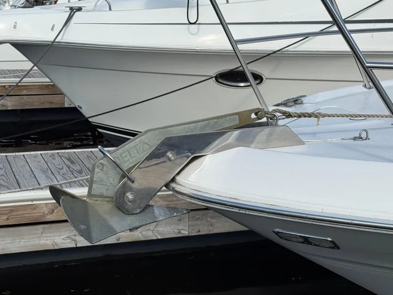 Slide: The Image of 1996 Sea Ray 400 Sedan Bridge yacht with anchor at marina dock. - 10