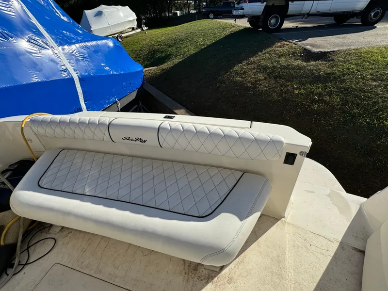 Slide: The Image of 1996 Sea Ray 400 Sedan Bridge boat seat with quilted upholstery. - 28