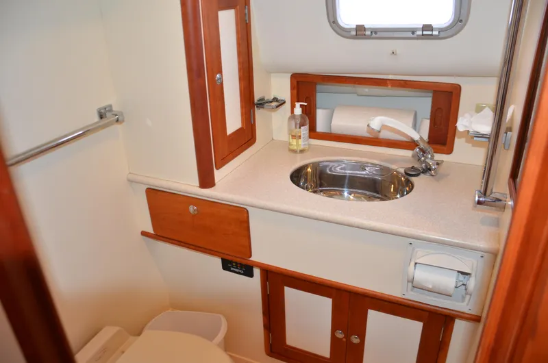 Slide: The Image of Built-in cooler compartment on a 2003 Little Harbor WhisperJet 38 boat. - 23