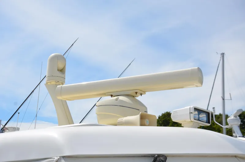 Slide: The Image of Radar equipment on 2003 Little Harbor WhisperJet 38 boat under clear sky. - 27