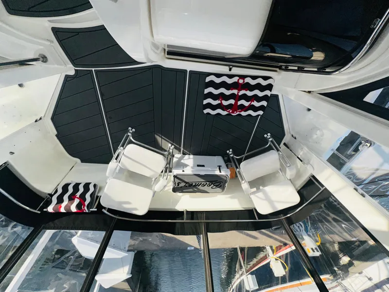 Slide: The Image of Interior of 2005 Meridian 368 Motor Yacht with chairs and nautical decor. - 11