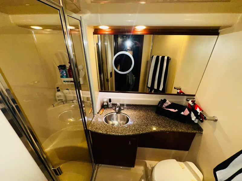 Slide: The Image of Luxurious bathroom in 2005 Meridian 368 Motor Yacht with granite countertop and shower. - 19