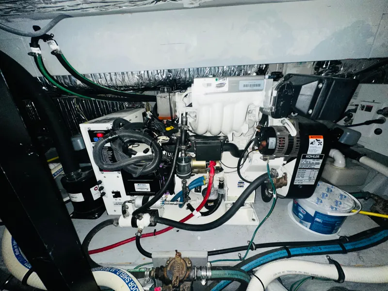 Slide: The Image of Engine room of 2005 Meridian 368 Motor Yacht with Kohler generator and wiring. - 27