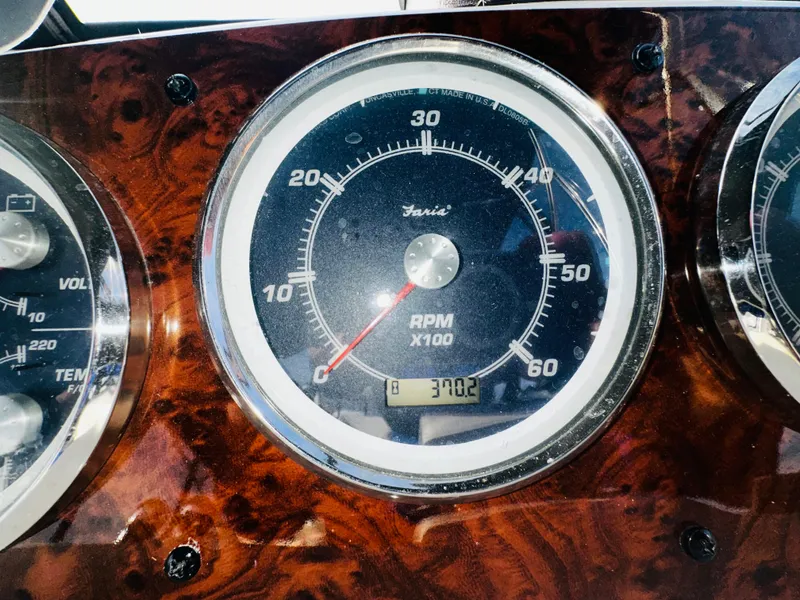 Slide: The Image of Close-up of a 2005 Meridian 368 Motor Yacht RPM gauge displaying 370.2 hours. - 29