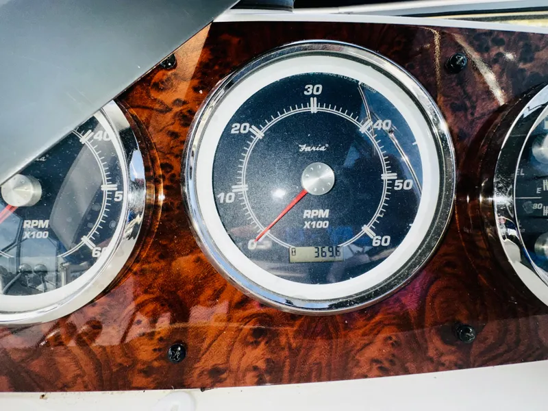 Slide: The Image of Dashboard of 2005 Meridian 368 Motor Yacht showing RPM gauges. - 30