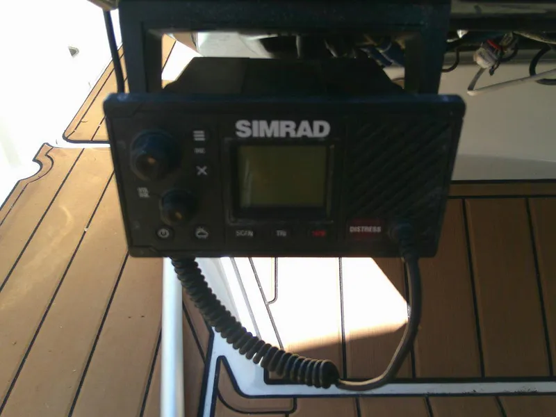 Slide: The Image of Simrad marine radio on 2018 Sea Ray SPX 230 boat deck. - 10