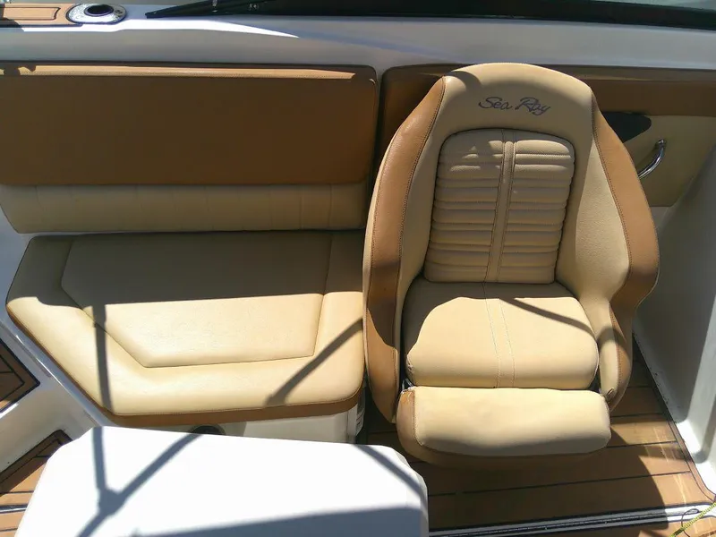 Slide: The Image of 2018 Sea Ray SPX 230 boat interior with tan leather seating. - 8