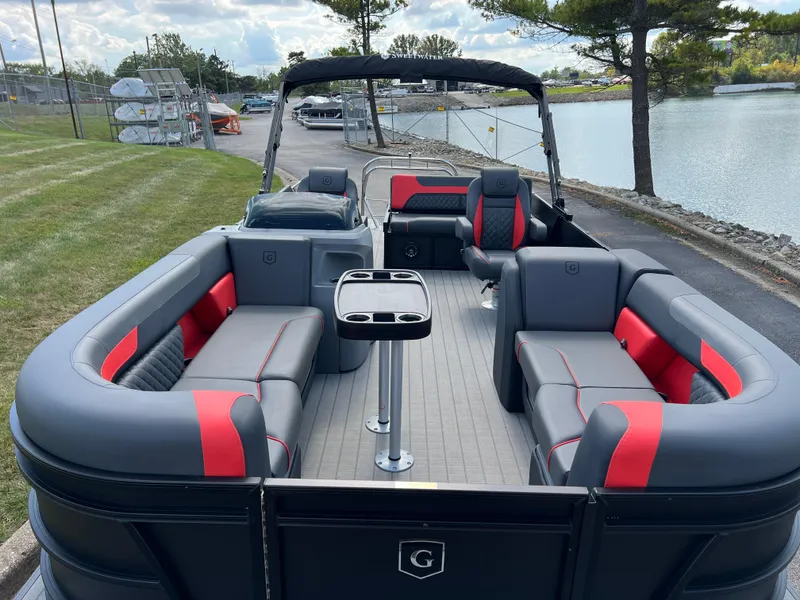 Slide: The Image of 2025 Godfrey SWEETWATER 2286 SFL pontoon boat with sleek seating and modern design. - 10
