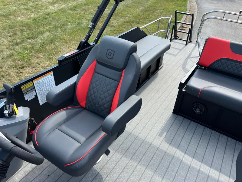 Slide: The Image of 2025 Godfrey SWEETWATER 2286 SFL boat interior with stylish seating and modern design. - 14