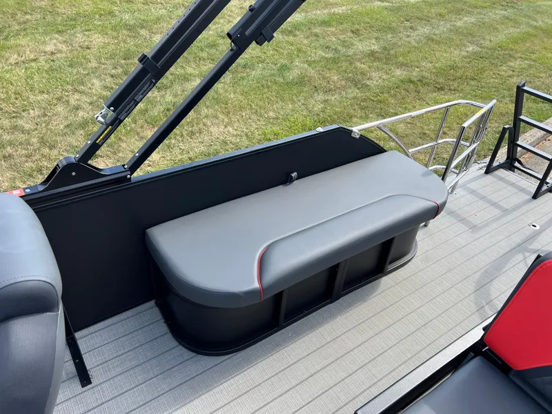 Slide: The Image of 2025 Godfrey SWEETWATER 2286 SFL boat interior with sleek seating and modern design. - 17