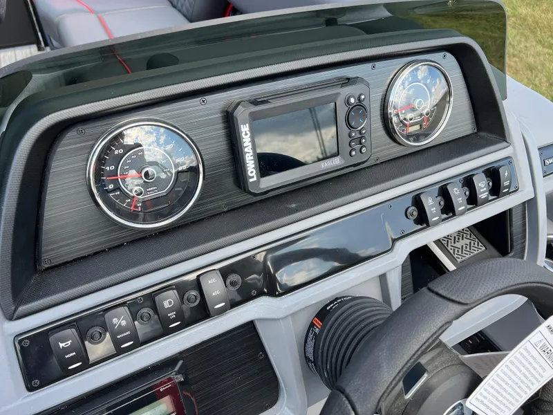 Slide: The Image of Dashboard of 2025 Godfrey SWEETWATER 2286 SFL with gauges and navigation system. - 26