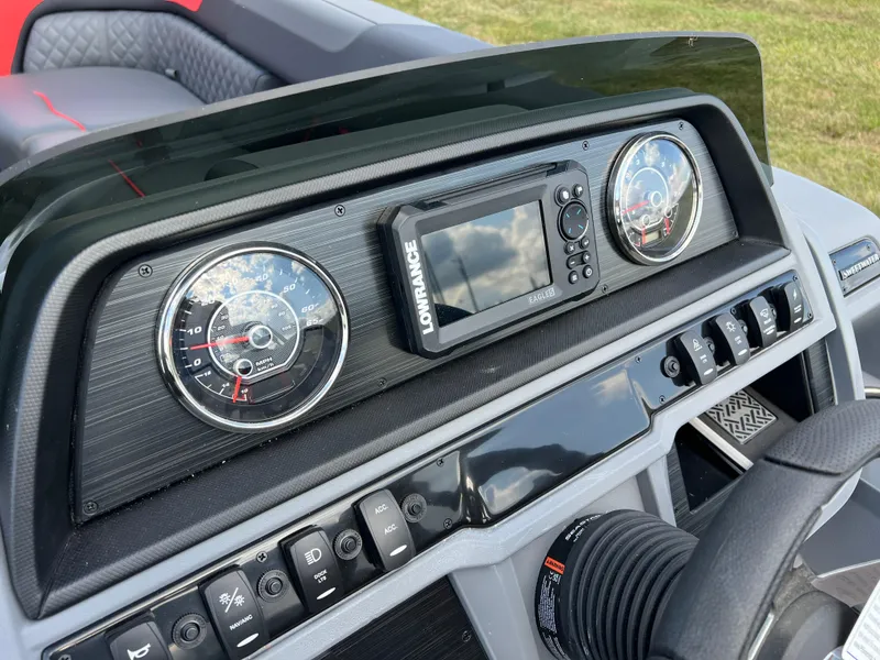 Slide: The Image of Dashboard of 2025 Godfrey SWEETWATER 2286 SFL with gauges and navigation system. - 30