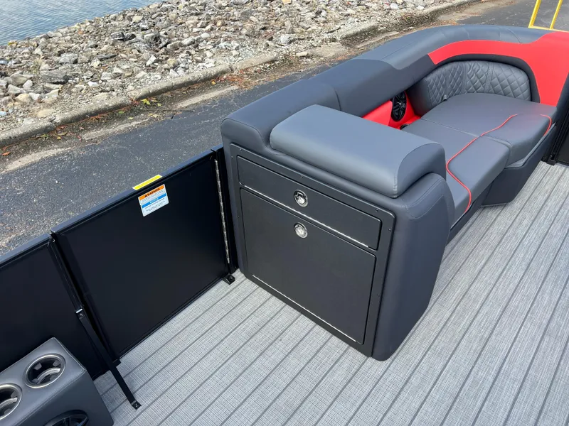 Slide: The Image of 2025 Godfrey SWEETWATER 2286 SFL boat interior with sleek seating and storage. - 31