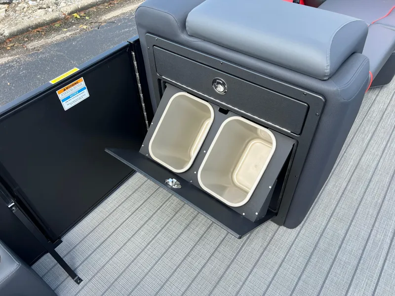 Slide: The Image of 2025 Godfrey SWEETWATER 2286 SFL boat interior with dual storage bins. - 32