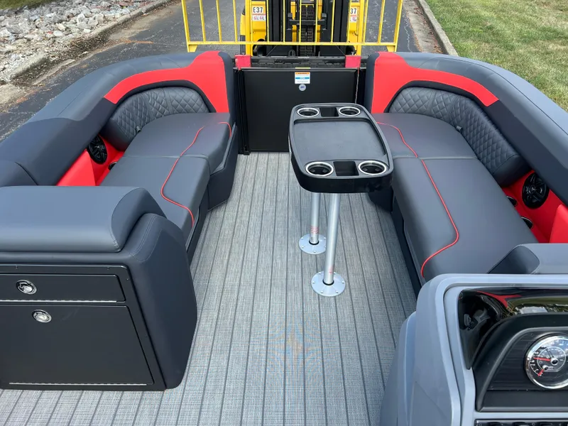 Slide: The Image of 2025 Godfrey SWEETWATER 2286 SFL interior with gray and red seating, table, and modern design. - 33