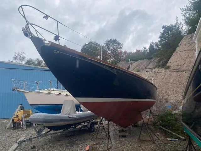 Slide: The Image of 1971 Hinckley Bermuda 40 sailboat on land stand. - 1