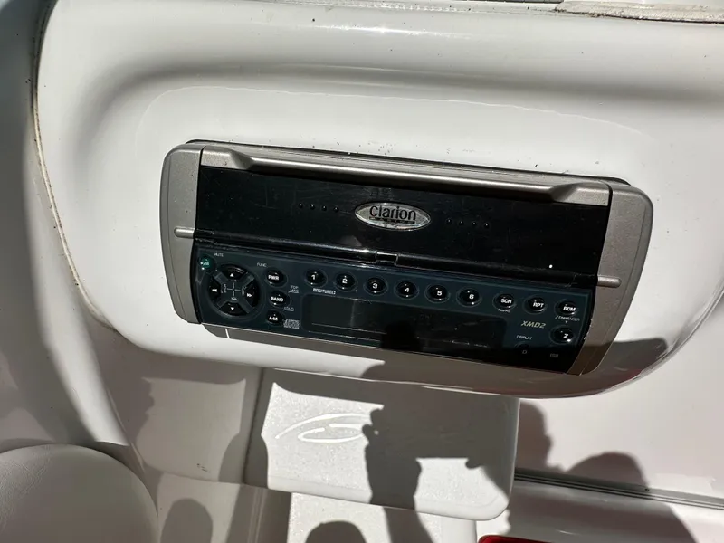 Slide: The Image of Clarion stereo system in a 2001 Baja 232 boat dashboard. - 11