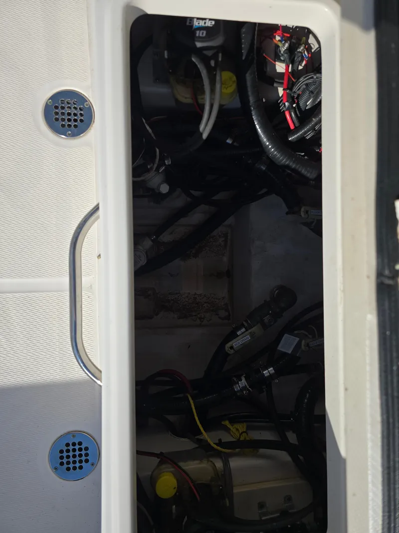 Slide: The Image of 2021 Blue Wave 2800 Makaira boat interior wiring and components. - 14