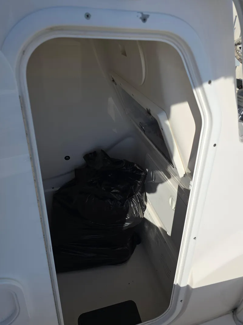 Slide: The Image of 2021 Blue Wave 2800 Makaira boat storage compartment interior. - 20