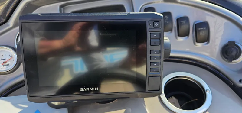 Slide: The Image of Garmin display on 2023 Sun Tracker Fishin' Barge 20 DLX dashboard. - 10
