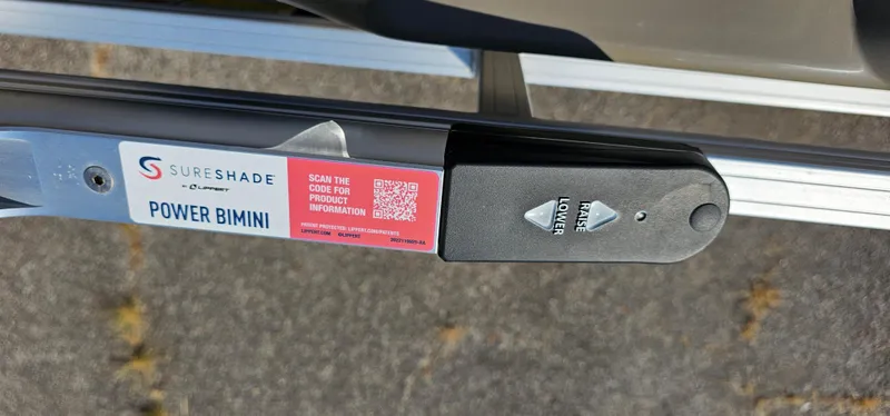 Slide: The Image of SureShade Power Bimini control on 2023 Sun Tracker Fishin' Barge 20 DLX boat. - 12