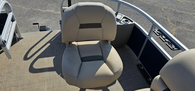 Slide: The Image of 2023 Sun Tracker Fishin' Barge 20 DLX boat seat, beige upholstery, spacious deck. - 3