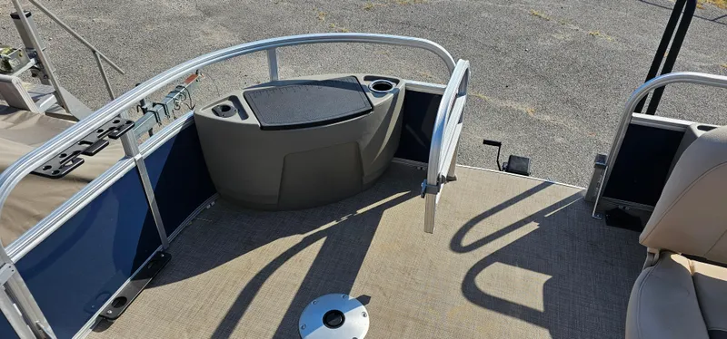 Slide: The Image of 2023 Sun Tracker Fishin' Barge 20 DLX deck with seating and railing. - 4