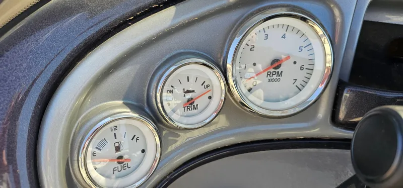 Slide: The Image of Dashboard gauges of 2023 Sun Tracker Fishin' Barge 20 DLX boat. - 9
