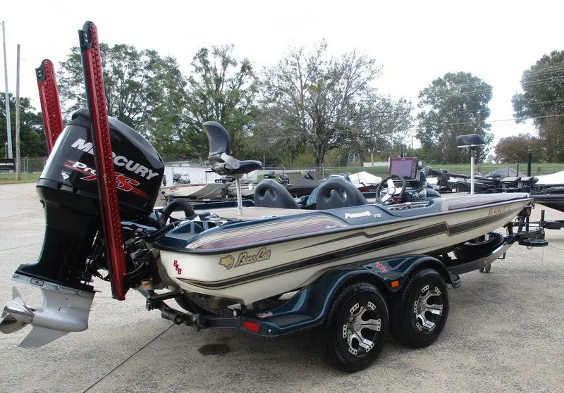 Slide: The Image of 2014 Bass Cat Puma FTD boat with Mercury engine on trailer. - 3