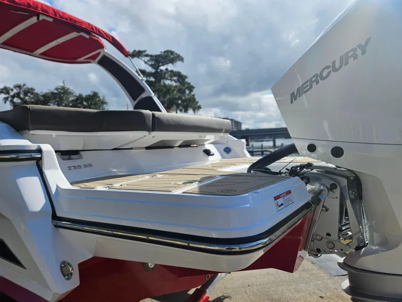 Slide: The Image of 2025 Monterey 235SS boat with Mercury engine, featuring sleek design and comfortable seating. - 10
