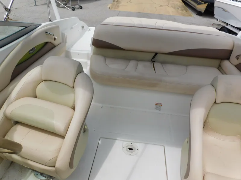 Slide: The Image of 2008 Chaparral 204 SSi boat interior with beige seating and spacious layout. - 9