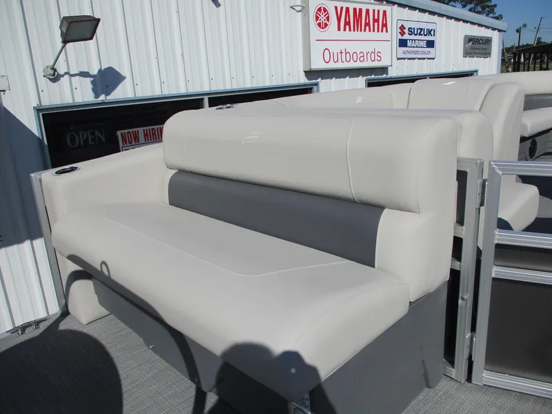 Slide: The Image of 2025 Starcraft LX 20 CB boat seating with beige and gray upholstery. - 7