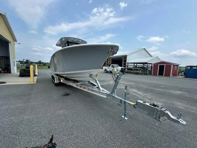 Slide: The Image of 2025 Sportsman 282 Open boat on trailer in outdoor storage area. - 7