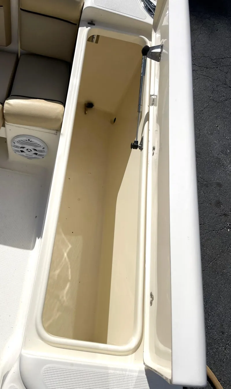 Slide: The Image of Open storage compartment on 2006 Scout 242 Abaco boat. - 5