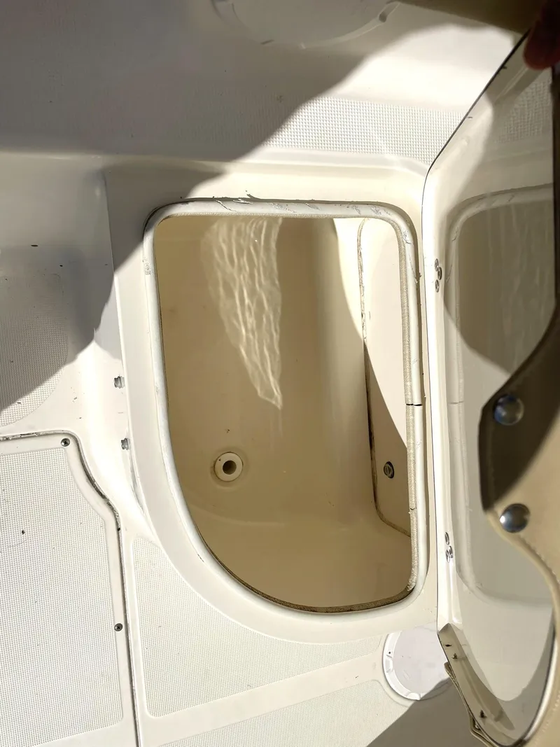 Slide: The Image of Open storage compartment on 2006 Scout 242 Abaco boat. - 8