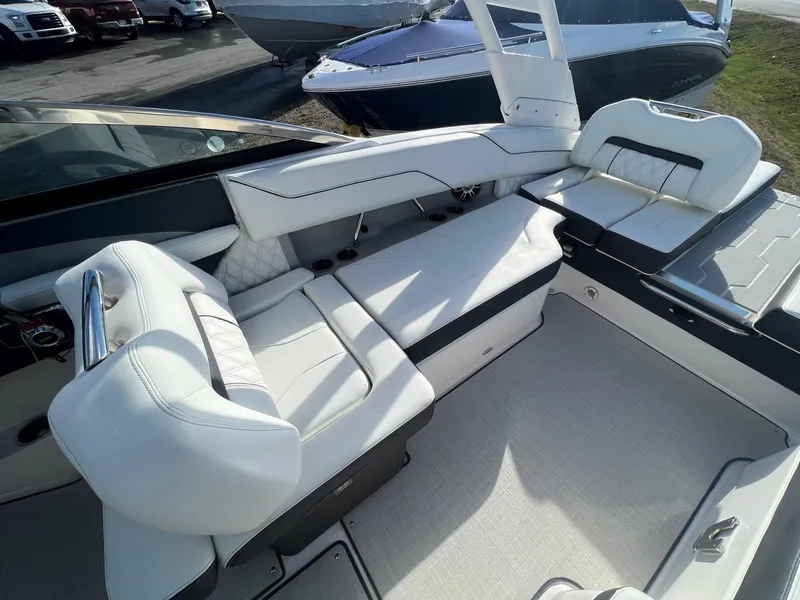 Slide: The Image of Luxurious 2025 Regal LS4 boat interior with white leather seating and modern design. - 6