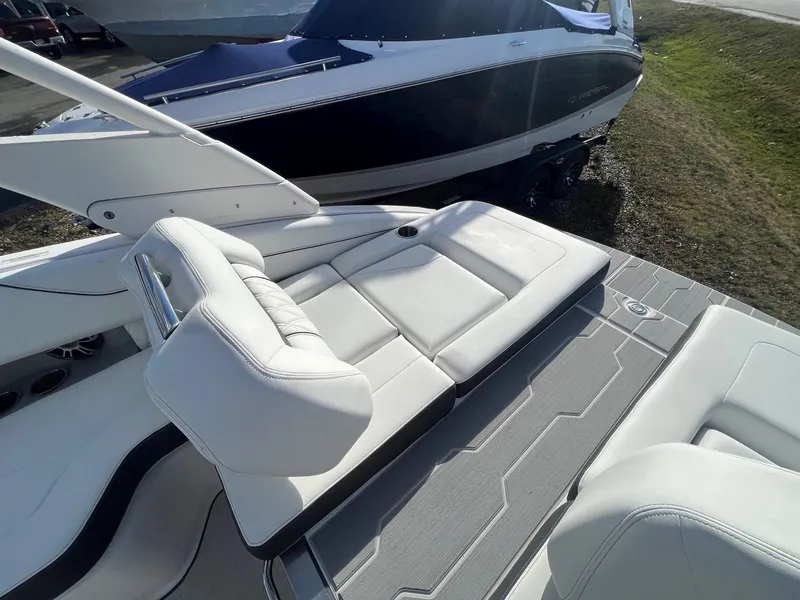 Slide: The Image of 2025 Regal LS4 boat with white leather seating and sleek design. - 7