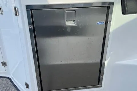 Slide: The Image of Stainless steel door on 2021 Monterey 295 Sport Yacht. - 16