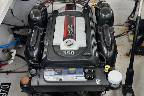 Slide: The Image of Engine of 2021 Monterey 295 Sport Yacht, featuring a 6.2L 350 horsepower motor. - 9