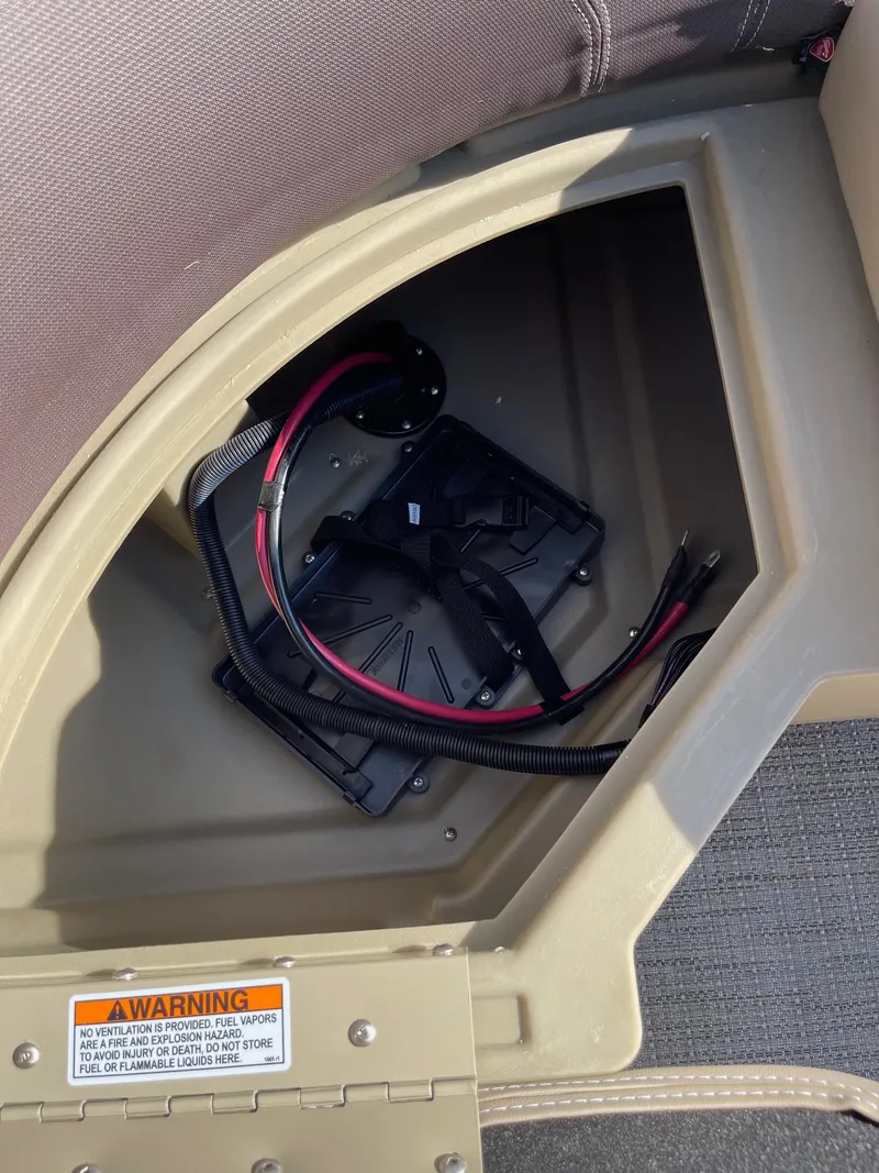 Slide: The Image of 2025 Sylvan 820 Mirage Cruise boat interior wiring compartment. - 15