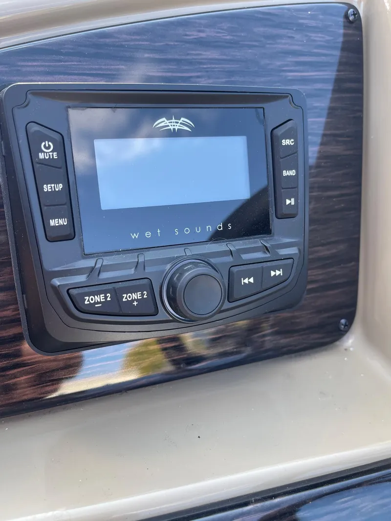 Slide: The Image of Wet Sounds audio system on 2025 Sylvan 820 Mirage Cruise boat dashboard. - 18