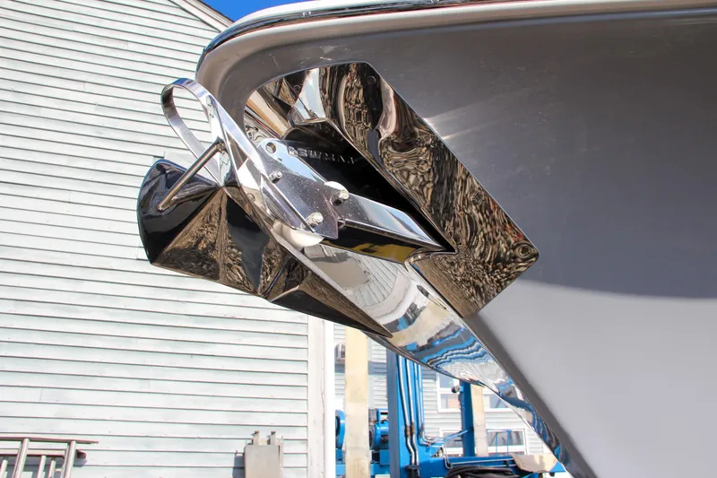 Slide: The Image of 2025 Sea Hunt Ultra 265 SE boat anchor detail, shiny chrome finish. - 9