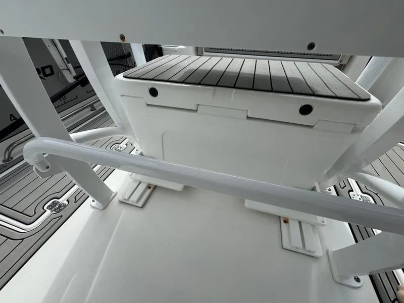 Slide: The Image of 2022 Sea Pro 259 Center Console boat interior with seating and storage. - 22