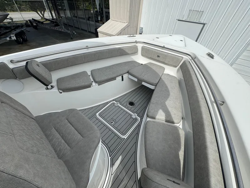 Slide: The Image of 2022 Sea Pro 259 Center Console boat with spacious seating and modern design. - 26