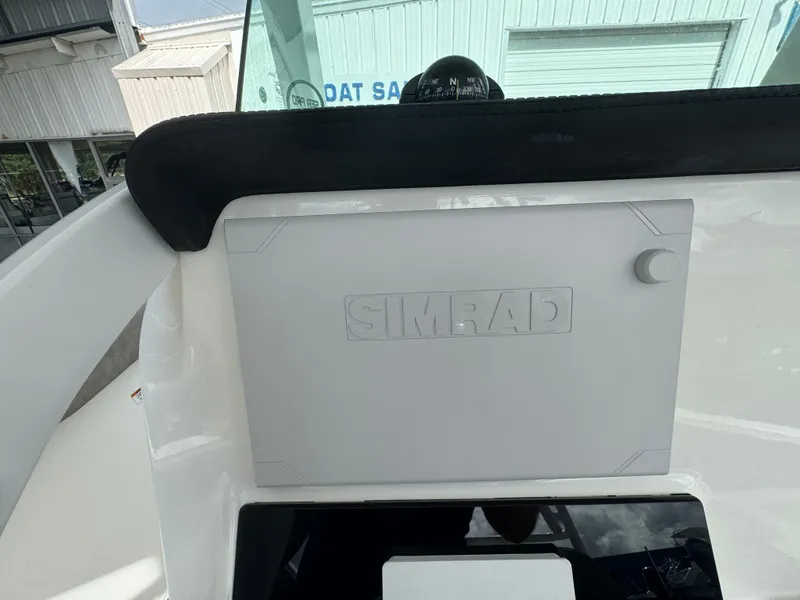 Slide: The Image of 2022 Sea Pro 259 Center Console with Simrad navigation system. - 30