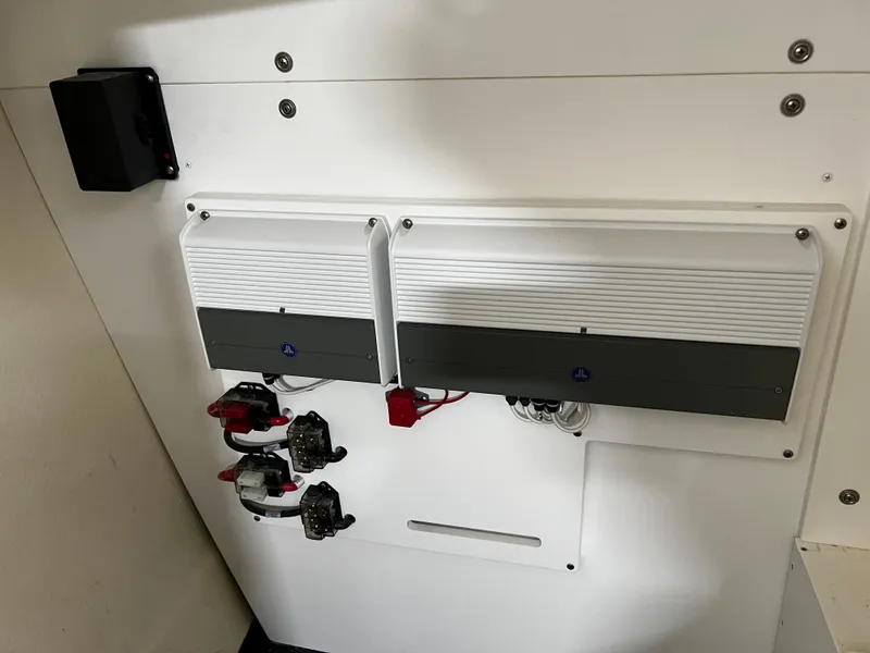 Slide: The Image of 2021 Cobalt 23SC electrical panel with dual battery switches and wiring. - 10