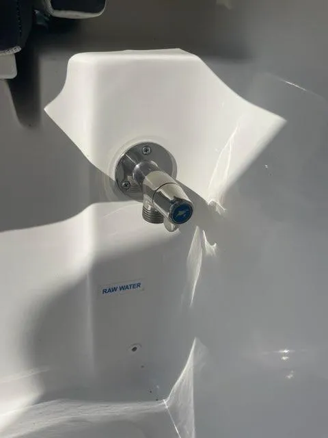 Slide: The Image of 2023 Tidewater 232 SS raw water outlet detail. - 10